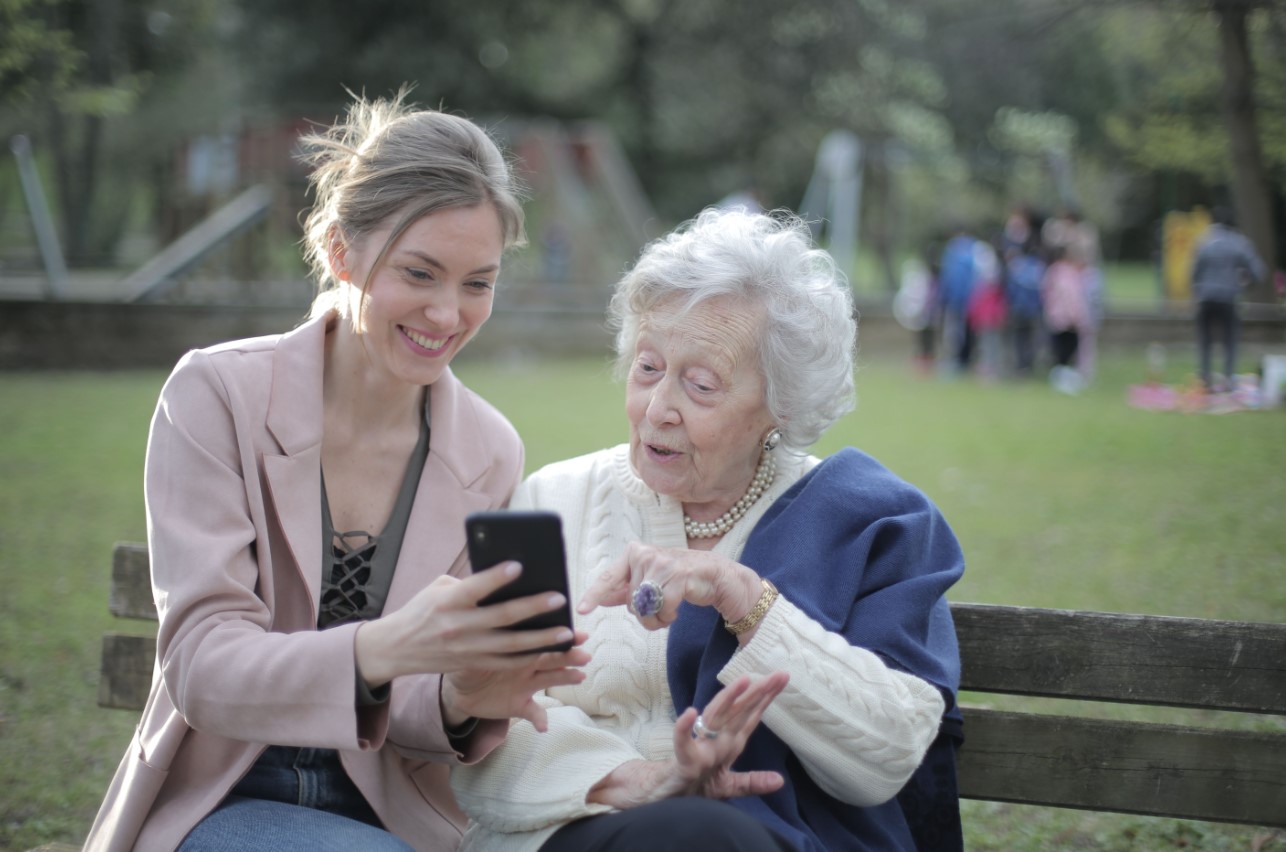 Caregiver enjoying a peaceful break while a trusted companion provides support
