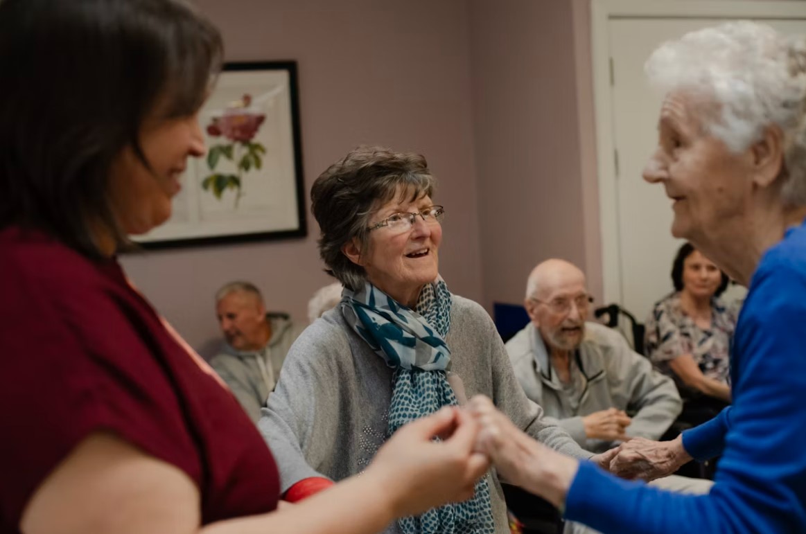 Two people reviewing community resources and information together